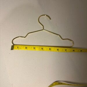 8” Gold Metal Hanger.  For all your pets clothes.
